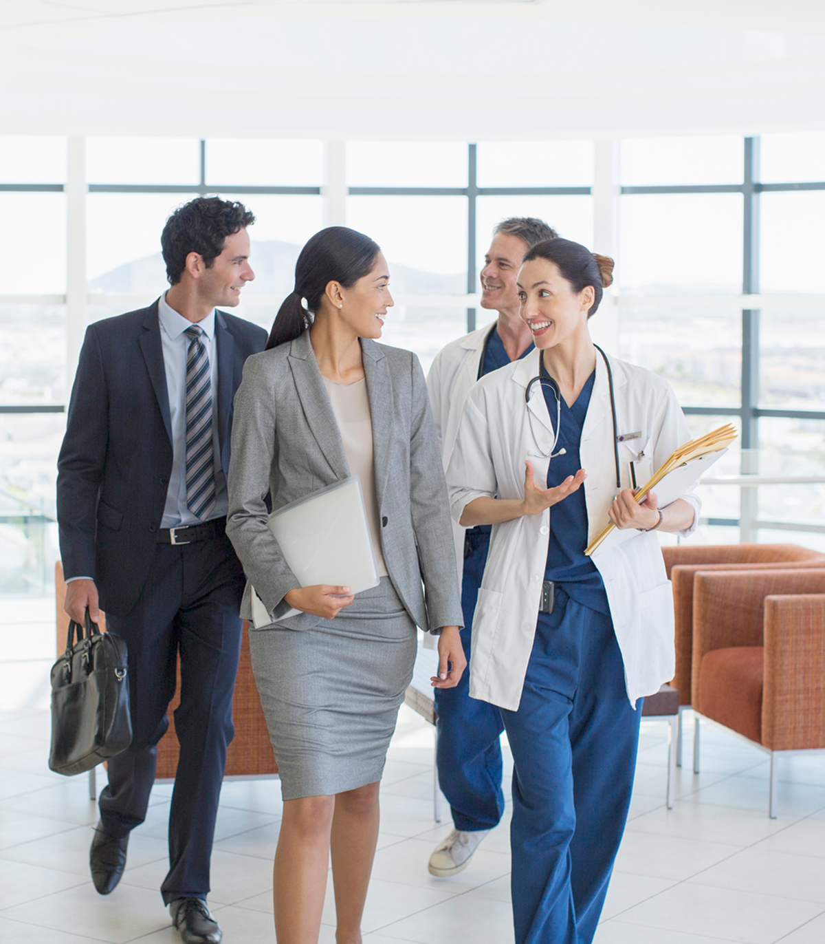 Diverse team discussing in bright office