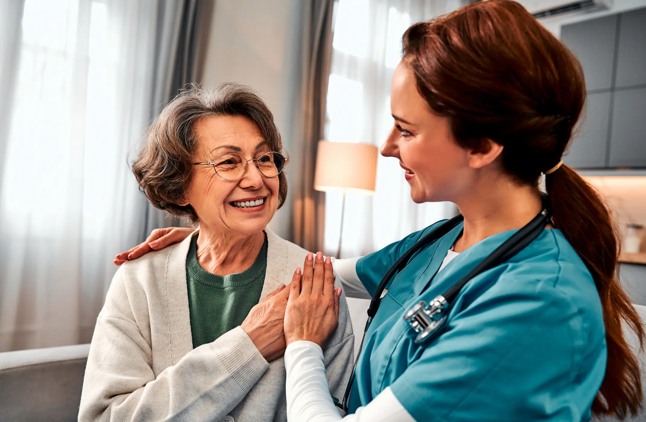 Medical caregiver hug and portrait of nurse with patient for medical help, healthcare or physiotherapy.